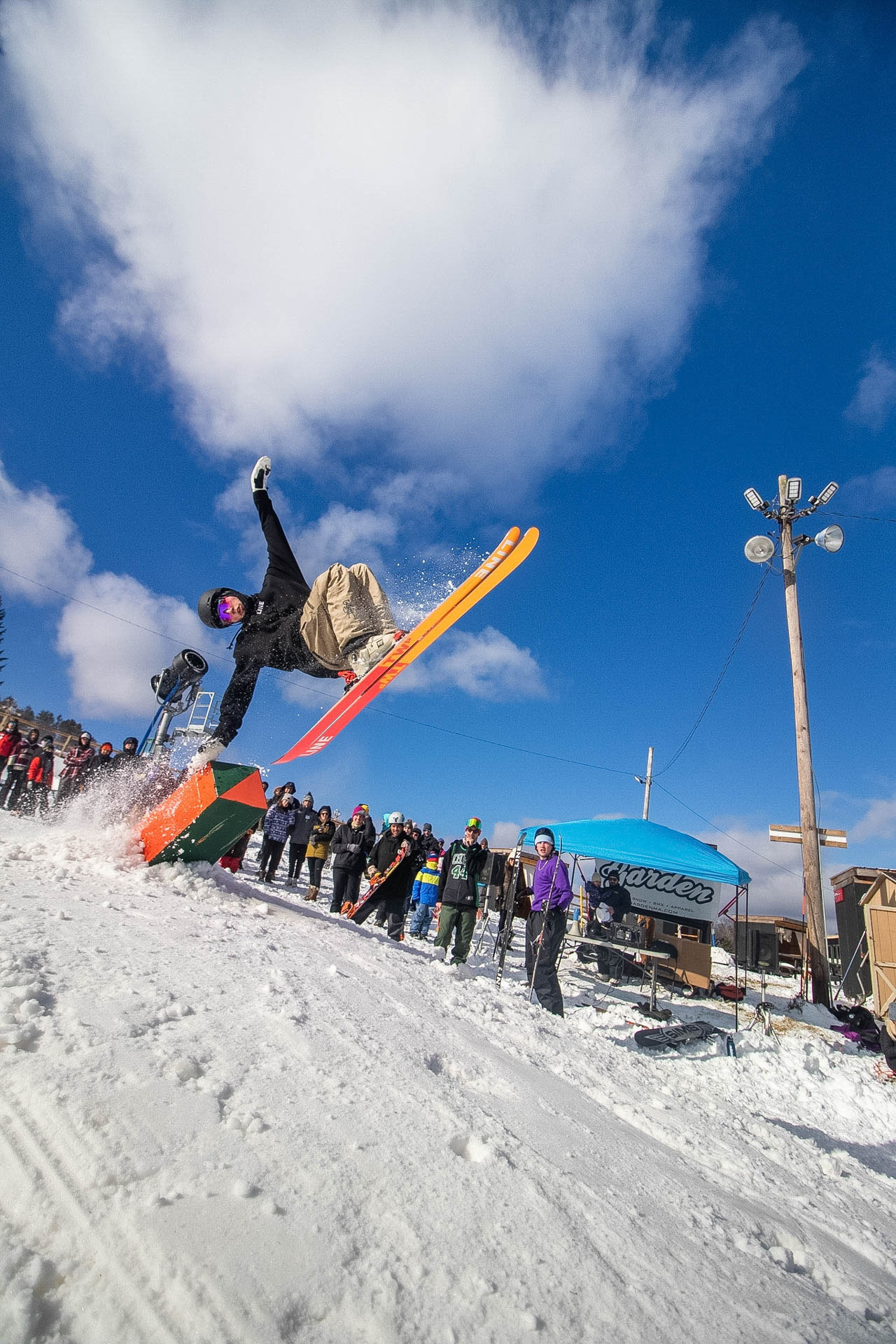 Skier catching air off a park feature